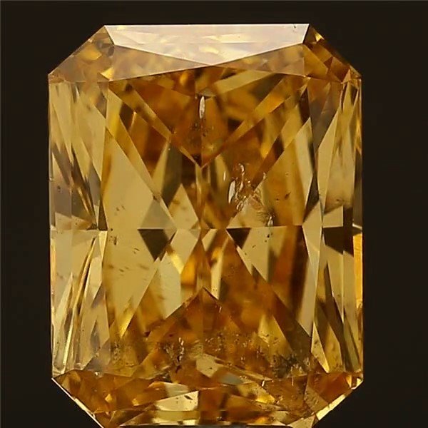A fancy champagne coloured radiant cut diamond