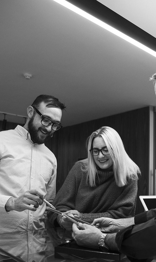 Choice Diamonds team members reviewing a piece of jewellery with a client